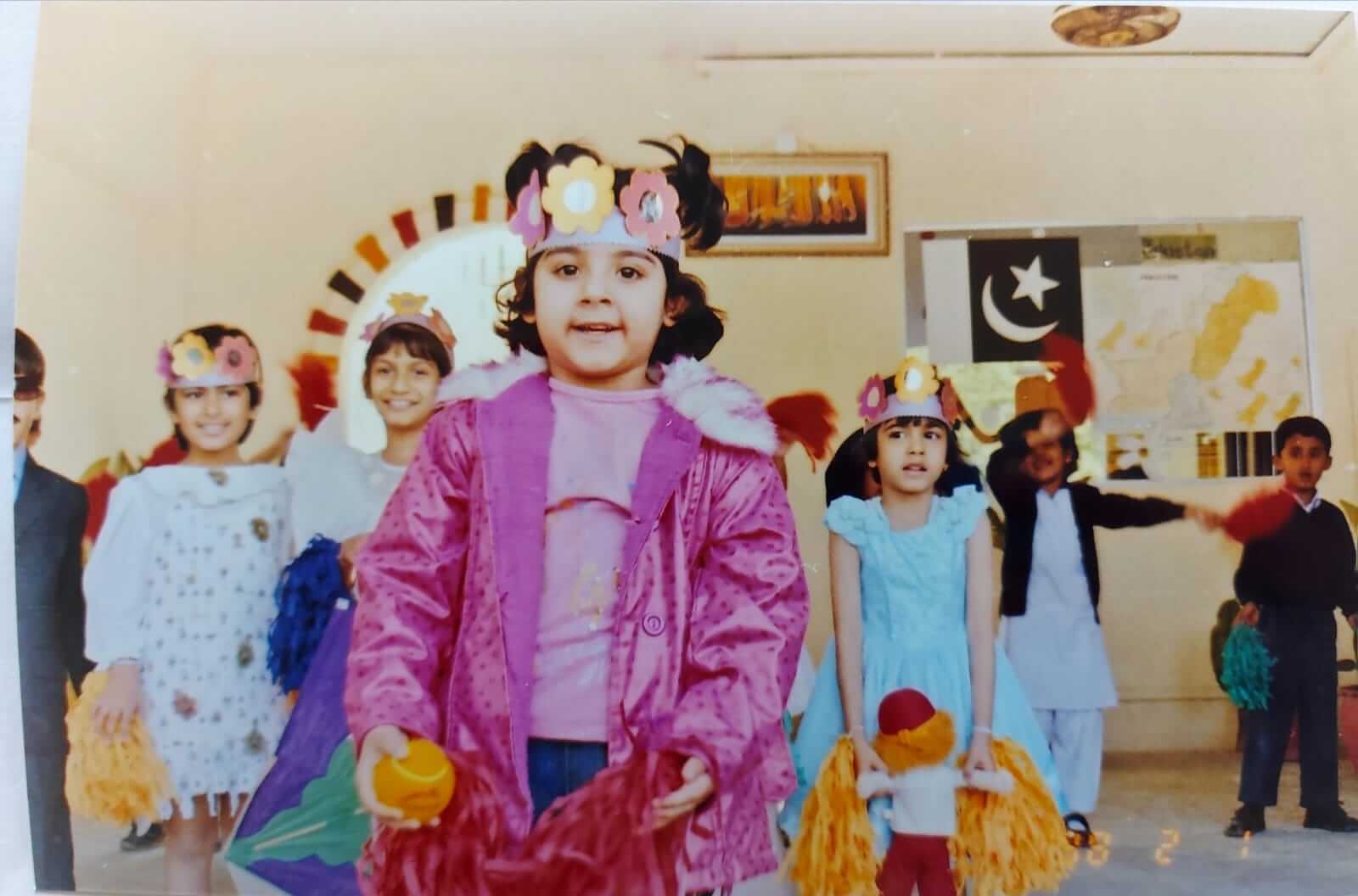 Preschool children in costumes at a school celebration